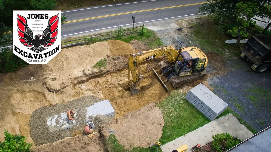 Aerial view of an excavator on a septic installation